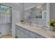 Bathroom vanity featuring marble countertops, stylish cabinetry, and modern fixtures at 208 Sumter Ave, Summerville, SC 29483