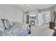 Well-appointed bedroom featuring a fireplace, built-in storage, and an ensuite bathroom at 208 Sumter Ave, Summerville, SC 29483