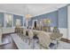 Spacious dining room with a chandelier and a full table setting with chairs at 208 Sumter Ave, Summerville, SC 29483