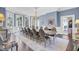 Formal dining room featuring a long table, chandelier, and elegant decor at 208 Sumter Ave, Summerville, SC 29483