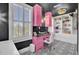 Charming home office features custom pink cabinetry, stylish monochrome tiling, and ample natural light at 208 Sumter Ave, Summerville, SC 29483