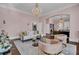 Comfortable living area with stylish seating, fireplace, and elegant lighting at 208 Sumter Ave, Summerville, SC 29483