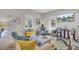 Inviting living space with hardwood floors, colorful accents, and lots of natural light at 208 Sumter Ave, Summerville, SC 29483