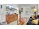 Cozy living room featuring a dresser, a comfortable sofa, and tasteful decor, creating an inviting atmosphere at 208 Sumter Ave, Summerville, SC 29483
