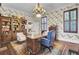 Traditional home office featuring a large desk, bookshelves, and refined decor at 208 Sumter Ave, Summerville, SC 29483