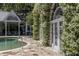 Inviting pool area with manicured flower-covered building, creating a tranquil outdoor space at 208 Sumter Ave, Summerville, SC 29483