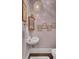 Charming powder room featuring unique decor and stylish fixtures at 208 Sumter Ave, Summerville, SC 29483