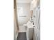 Clean bathroom features a modern vanity, toilet, and black and white patterned floor tiles at 2157 Jeff St, North Charleston, SC 29405