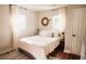 Bright bedroom featuring a comfortable bed with wooden floor and light-colored walls at 2157 Jeff St, North Charleston, SC 29405