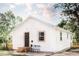Exterior view of charming home, features include white siding, windows, front door, and a compact front porch at 2157 Jeff St, North Charleston, SC 29405