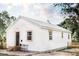 Well-maintained home with a fresh white exterior, neatly framed windows, and a welcoming front entrance at 2157 Jeff St, North Charleston, SC 29405
