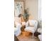 Comfortable sitting area featuring a plush armchair, side table with decor, and a cozy ambiance at 2157 Jeff St, North Charleston, SC 29405
