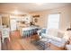 Bright and open-concept living space connecting to a well-equipped kitchen with a breakfast bar at 2157 Jeff St, North Charleston, SC 29405