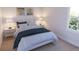 Comfortable bedroom with warm lighting and large window, creating a relaxing ambiance at 2161 W Jimtown Dr # 101, North Charleston, SC 29405