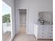 Bright bedroom featuring closet and exterior view, creating a seamless indoor-outdoor experience at 2161 W Jimtown Dr # 101, North Charleston, SC 29405