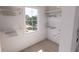 Walk-in closet with built-in shelving and hanging rods, providing ample storage at 2161 W Jimtown Dr # 101, North Charleston, SC 29405