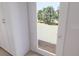 Bright interior with a door leading to an outdoor balcony with white railings at 2161 W Jimtown Dr # 101, North Charleston, SC 29405