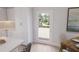 Modern kitchen featuring stainless appliances, an island with seating, and access to the outdoors at 2161 W Jimtown Dr # 101, North Charleston, SC 29405