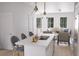 Bright kitchen featuring pendant lighting, an island with sink, and open access to the living room at 2161 W Jimtown Dr # 101, North Charleston, SC 29405