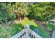 Aerial view of backyard with mature trees and fire pit at 2228 Daniel Island Dr, Charleston, SC 29492