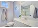 Bright, remodeled bathroom featuring fresh paint, new fixtures, and a view into the glass shower at 2228 Daniel Island Dr, Charleston, SC 29492