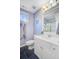 Bright, remodeled bathroom featuring fresh paint, new fixtures, and a window for natural light at 2228 Daniel Island Dr, Charleston, SC 29492