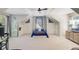 Unique bedroom featuring a ceiling fan, neutral paint, TV, window, built in shelves, and carpeted floors at 2228 Daniel Island Dr, Charleston, SC 29492