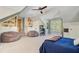 Inviting bonus room featuring stairs, carpet, bean bags, shelves, a desk and a large window at 2228 Daniel Island Dr, Charleston, SC 29492