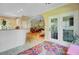Hallway view to living room featuring hardwood floors and an open design at 2228 Daniel Island Dr, Charleston, SC 29492