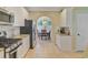 Modern kitchen with stainless steel appliances, granite countertops, and white subway tile backsplash at 2228 Daniel Island Dr, Charleston, SC 29492