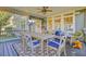 Relaxing screened patio with comfortable seating and a dining area, perfect for outdoor enjoyment at 2228 Daniel Island Dr, Charleston, SC 29492