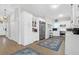 Well-lit kitchen with stainless appliances, ample cabinet space, and seamless flow for entertaining at 2514 Myrtle Ave, Sullivans Island, SC 29482