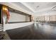 Elegant event space featuring a stage, hardwood floors, and sophisticated lighting for special occasions at 274 Tupelo Lake Dr, Summerville, SC 29486