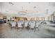 Spacious event space with rows of chairs, elegant chandeliers, and ample natural light for gatherings at 274 Tupelo Lake Dr, Summerville, SC 29486
