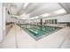 Bright indoor swimming pool with clear water, modern lighting, and ample space for exercise at 274 Tupelo Lake Dr, Summerville, SC 29486