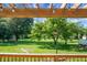Spacious backyard with a birdhouse and mature trees, ideal for outdoor enjoyment at 286 Mallard Lake Rd, Dorchester, SC 29437