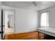 Minimalist bedroom design with a bed frame, hardwood floors, and natural light at 286 Mallard Lake Rd, Dorchester, SC 29437