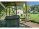 Well-equipped chicken coop with ladders, boxes, and a protective wire fence for poultry at 286 Mallard Lake Rd, Dorchester, SC 29437