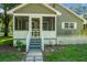 Charming front porch with white picket fence and steps to the entrance at 286 Mallard Lake Rd, Dorchester, SC 29437