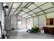Spacious garage with high ceilings and ample storage space for vehicles, equipment, and projects at 286 Mallard Lake Rd, Dorchester, SC 29437