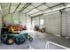 Large garage space with overhead lighting, workbench, and plenty of room for projects or storage at 286 Mallard Lake Rd, Dorchester, SC 29437