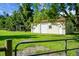 Backyard featuring two large outbuildings with ample storage space in a fenced yard at 286 Mallard Lake Rd, Dorchester, SC 29437