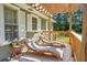 Relaxing deck with lounge chairs and a view of the surrounding greenery at 286 Mallard Lake Rd, Dorchester, SC 29437