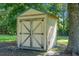 Outdoor shed with double doors, providing extra storage space and functionality at 286 Mallard Lake Rd, Dorchester, SC 29437