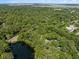 Stunning aerial view of the property, highlighting its secluded location amidst lush trees and serene surroundings at 2938 Old Drake Dr, Seabrook Island, SC 29455