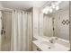 Well-lit bathroom with a shower and a sink vanity with a bright mirror creating an airy and functional space at 2938 Old Drake Dr, Seabrook Island, SC 29455
