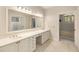 Bathroom featuring a double vanity with ample counter space, leading to separate areas at 2938 Old Drake Dr, Seabrook Island, SC 29455
