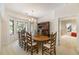 Formal dining room with large table, hutch, and chandelier, creating a great entertaining space at 2938 Old Drake Dr, Seabrook Island, SC 29455