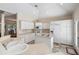 Bright kitchen featuring white cabinetry, an island cooktop, and modern appliances at 2938 Old Drake Dr, Seabrook Island, SC 29455