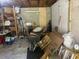 Unfinished basement space showing concrete walls and ceiling, offering potential for renovation at 306 Park St, Saint George, SC 29477